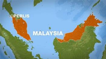 Malaysia finds mass graves of suspected migrants