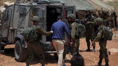 Israeli army detains 11 Palestinians in W. Bank raids