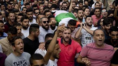 Palestinian woman dies after 